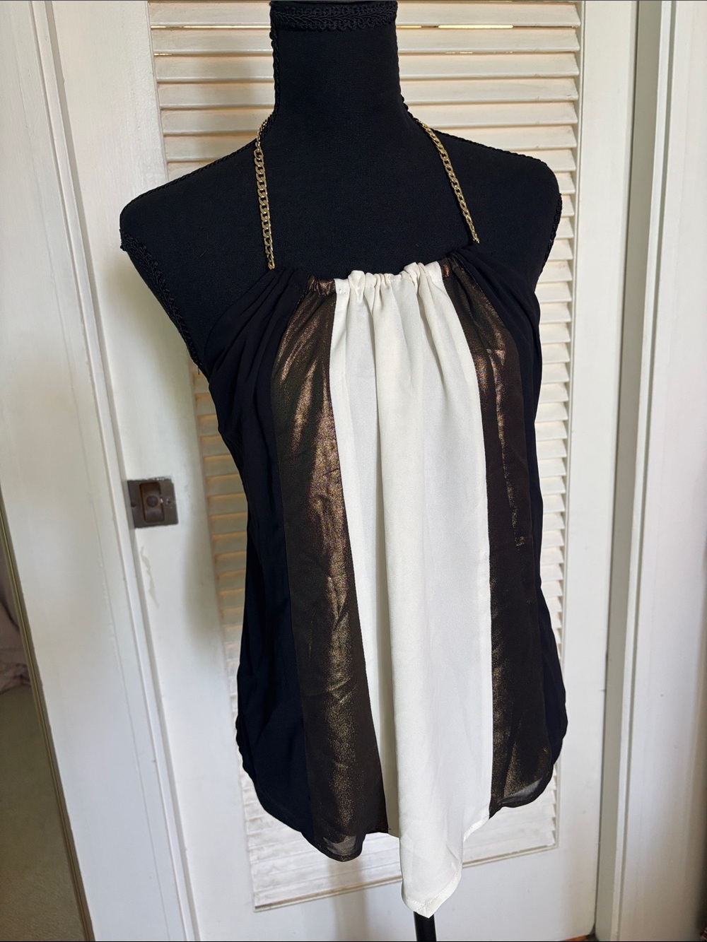 Express chain halter top with tie back.